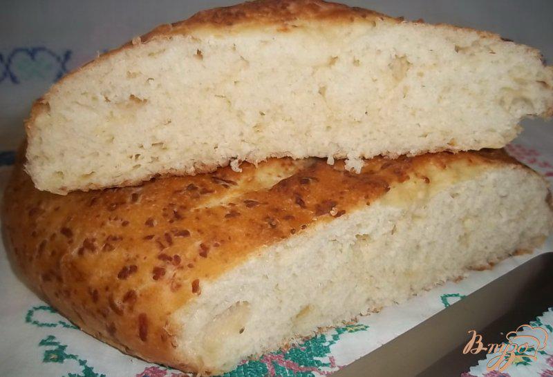 Фото приготовление рецепта: Сырный французский хлеб шаг №7