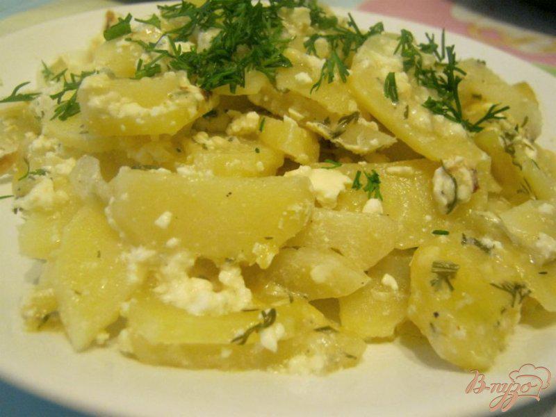 Фото приготовление рецепта: Картофель со сметаной в горшочке шаг №7