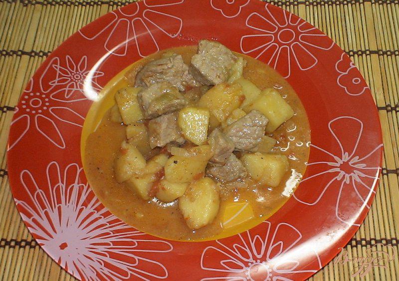 Фото приготовление рецепта: Картошка тушеная со свининой шаг №8