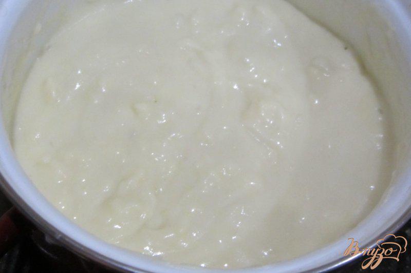 Фото приготовление рецепта: Сырный крем-суп шаг №8