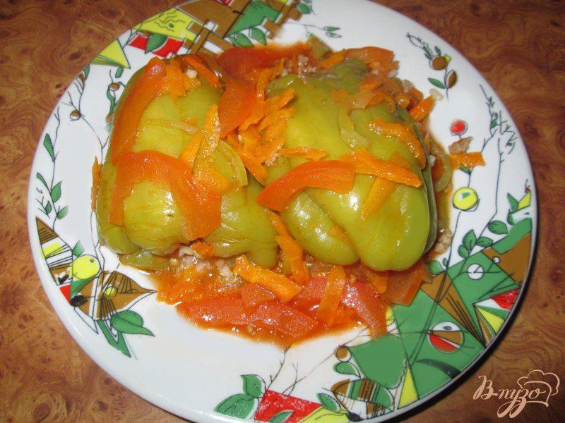 Фото приготовление рецепта: Фаршированные болгарские перцы под томатным соусом шаг №8