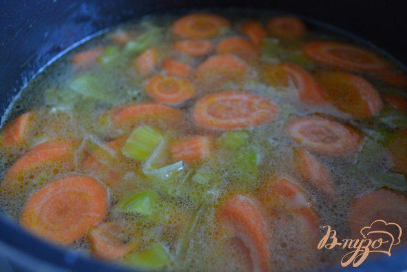 Фото приготовление рецепта: Морковный суп-пюре с горохом нут шаг №2