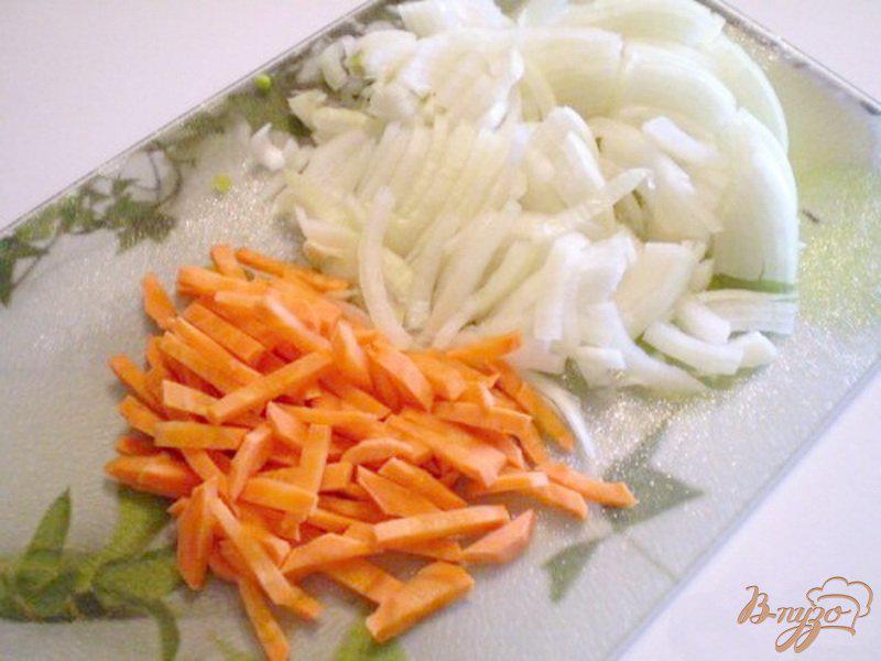 Фото приготовление рецепта: Рисовый суп на копченой ножке шаг №2