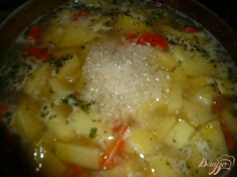 Фото приготовление рецепта: Картофель с рисом тушеный шаг №9