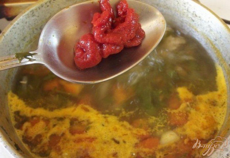 Фото приготовление рецепта: Суп с томатами шаг №7