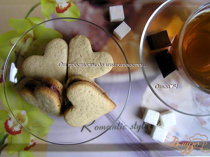 Фото приготовление рецепта: Печенье «Кофейные сердечки» с шоколадным кремом шаг №7