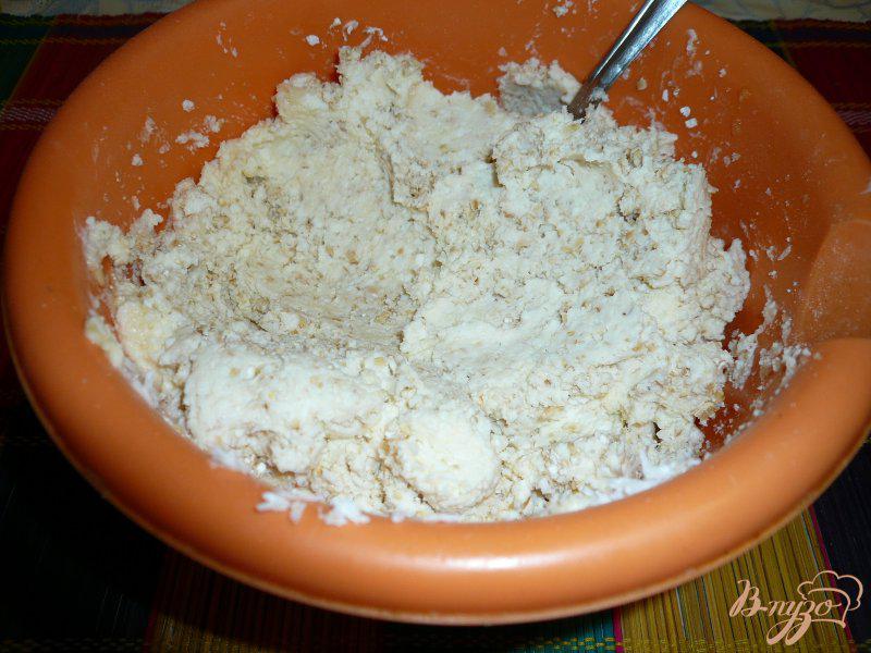 Фото приготовление рецепта: Запеканка творожная с кокосовой стружкой и отрубями шаг №6