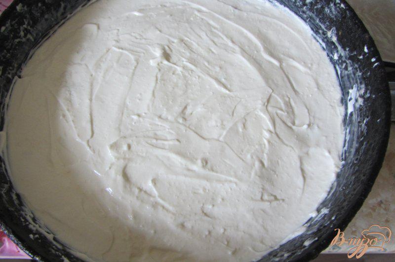 Фото приготовление рецепта: Творожная запеканка с манной крупой и изюмом шаг №12