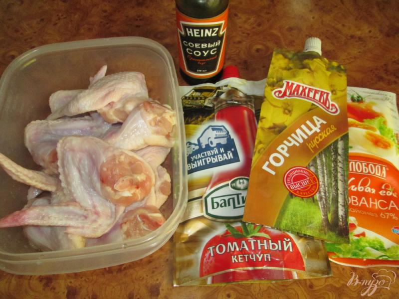 Фото приготовление рецепта: Куриные крылышки запеченные в соусе шаг №1