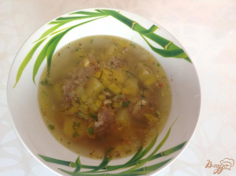 Фото приготовление рецепта: Гречневый суп со свининой шаг №6