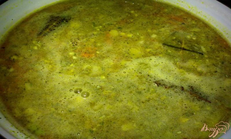 Фото приготовление рецепта: Простой куриный суп с рисом шаг №7