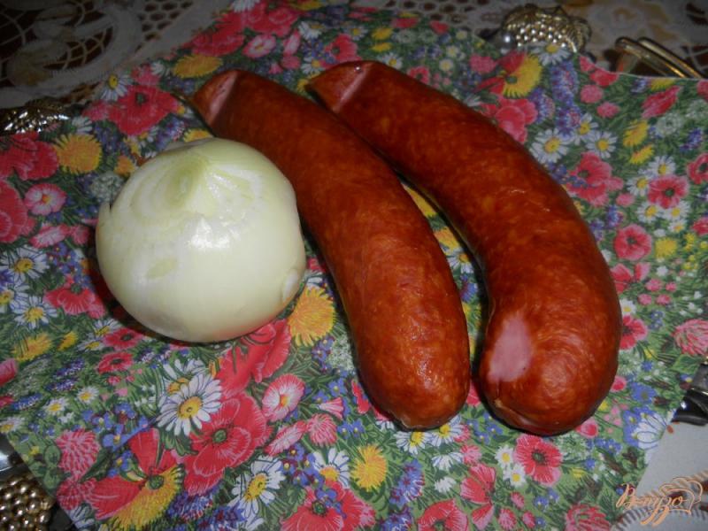 Фото приготовление рецепта: Тушеная капусты с баварскими колбасками шаг №2