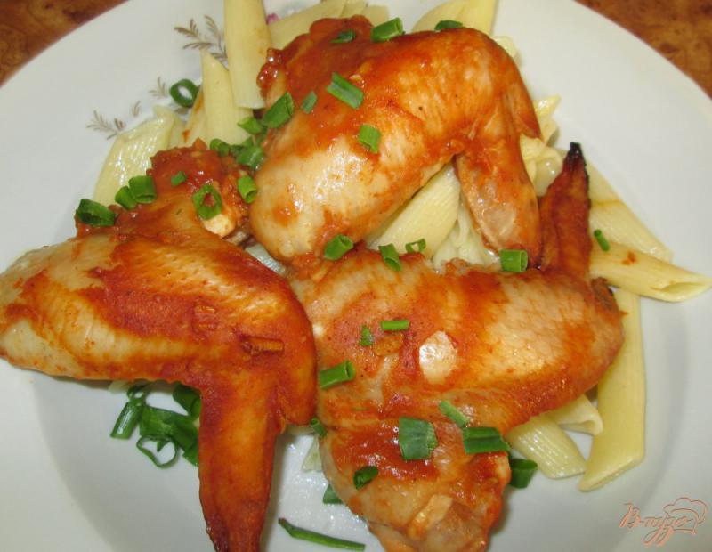 Фото приготовление рецепта: Сочные куриные крылья, запеченные в духовке шаг №8