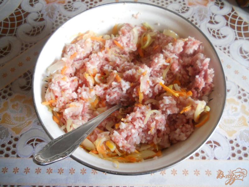 Фото приготовление рецепта: Голубцы в томатно-сметанном соусе шаг №9