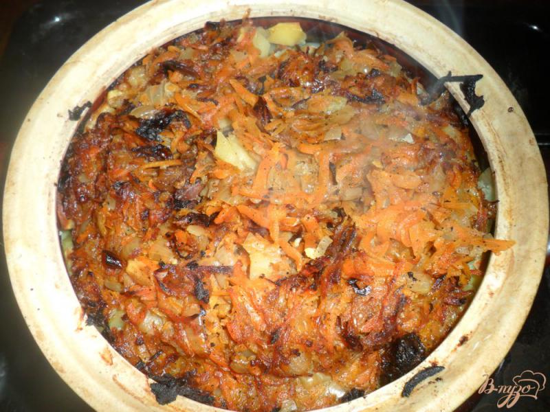 Фото приготовление рецепта: Тушенный картофель в горшочке с свиными ребрами шаг №6