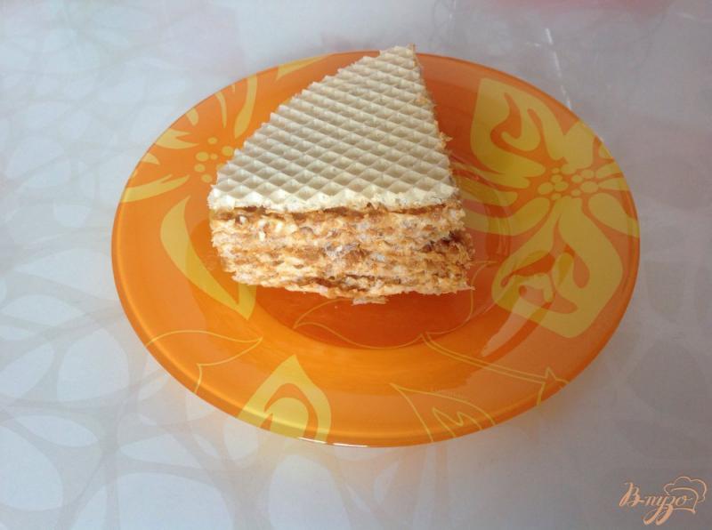 Фото приготовление рецепта: Вафельный торт со сгущенкой шаг №7