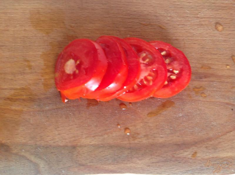Фото приготовление рецепта: Синие с помидорами и чесноком шаг №7