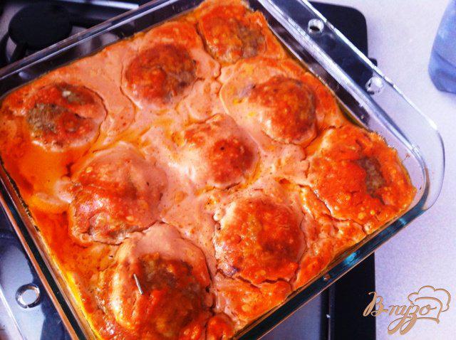 Фото приготовление рецепта: Тефтели в томатном соусе шаг №9