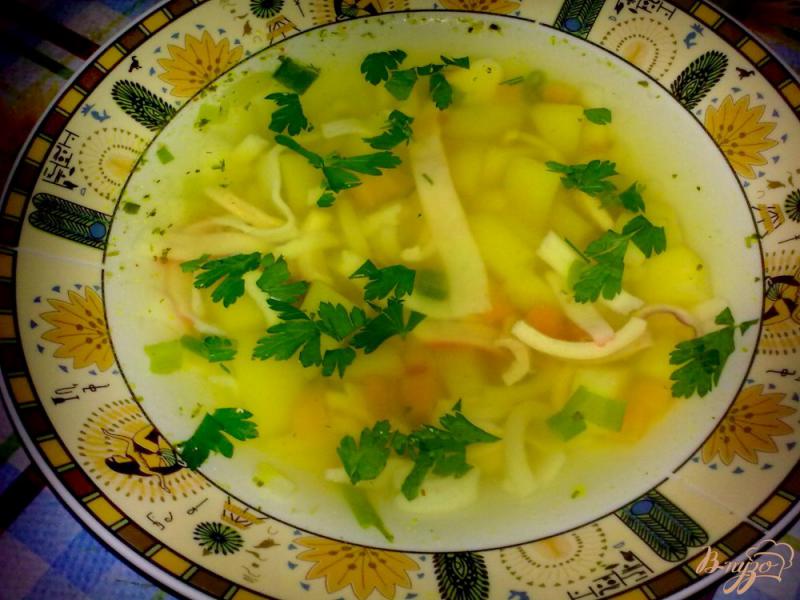 Фото приготовление рецепта: Суп с кальмаром шаг №6