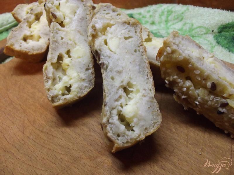 Фото приготовление рецепта: Заливной овсяный хлеб с овечьей брынзой шаг №10