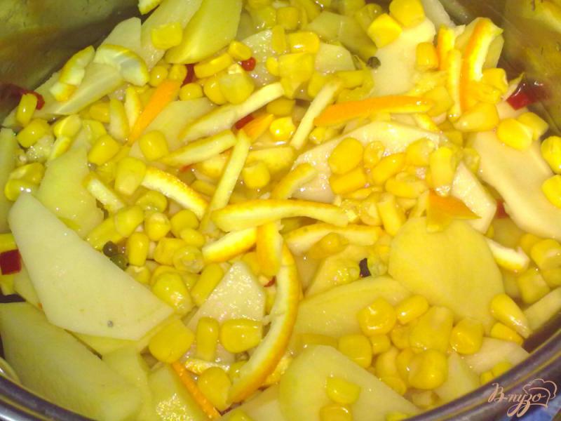 Фото приготовление рецепта: Картофель в апельсиновом соке шаг №6