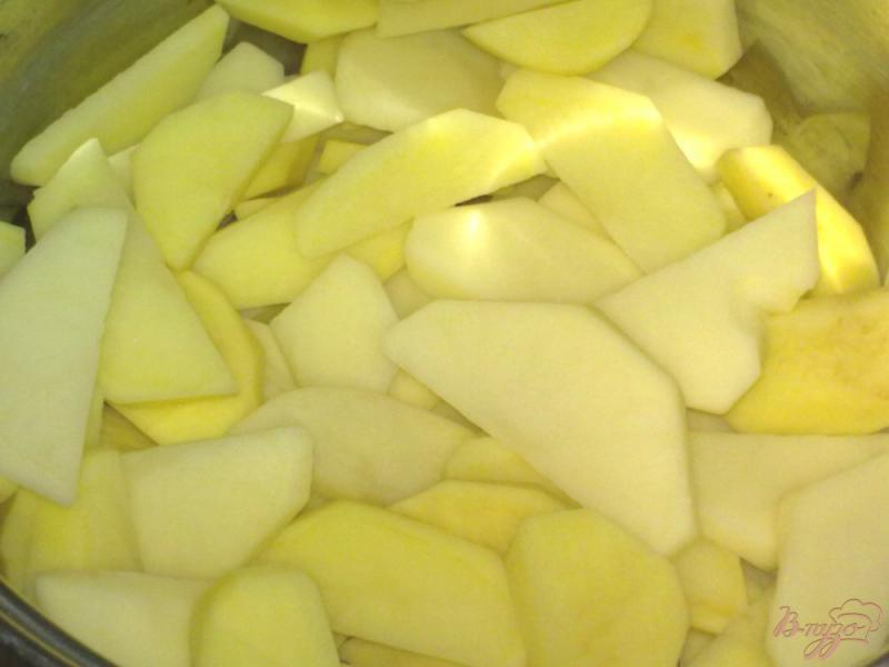 Фото приготовление рецепта: Картофель в апельсиновом соке шаг №1