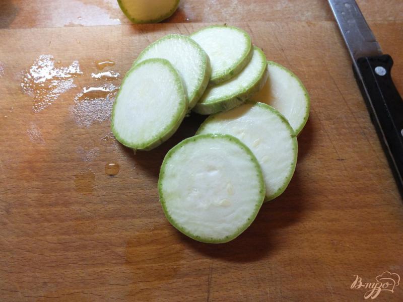 Фото приготовление рецепта: Хек запеченный с овощами шаг №2