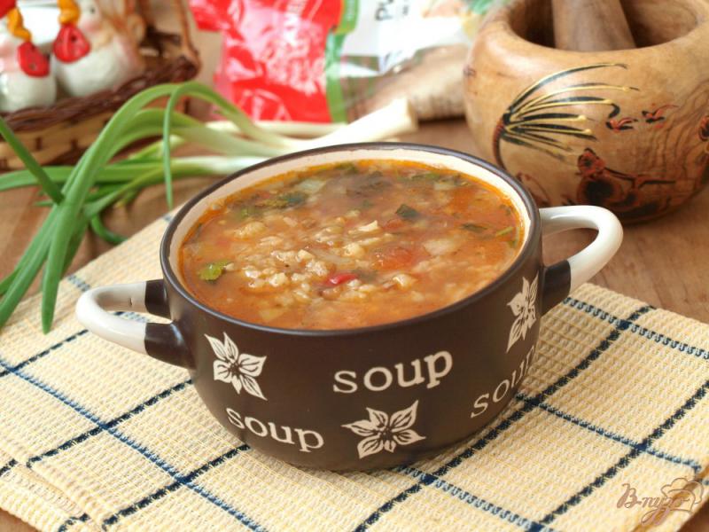 Фото приготовление рецепта: Рисовый суп с чечевицей и томатами шаг №6