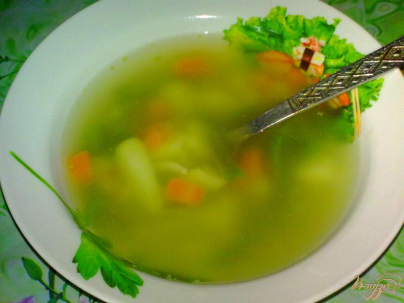 Фото приготовление рецепта: Суп с кальмаром шаг №7