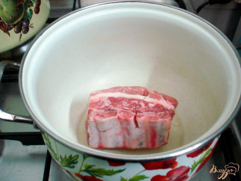 Фото приготовление рецепта: Щавелевый суп на свиных рёбрышках с рисом шаг №1