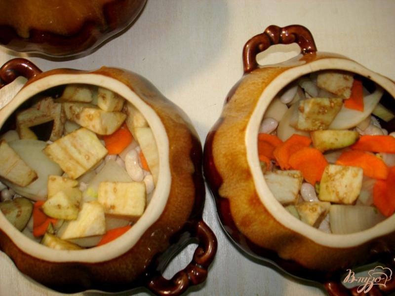 Фото приготовление рецепта: Чанахи в горщочках, с фасолью и баклажанами шаг №11