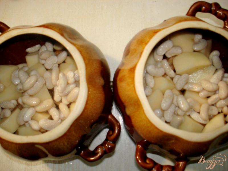 Фото приготовление рецепта: Чанахи в горщочках, с фасолью и баклажанами шаг №9