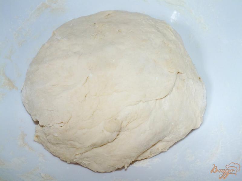 Фото приготовление рецепта: Пирожки на сметане с капустой шаг №8
