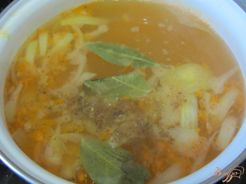 Фото приготовление рецепта: Рыбный суп с рисом шаг №6