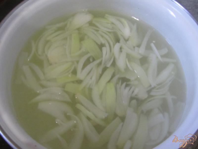 Фото приготовление рецепта: Рыбный суп с рисом шаг №2