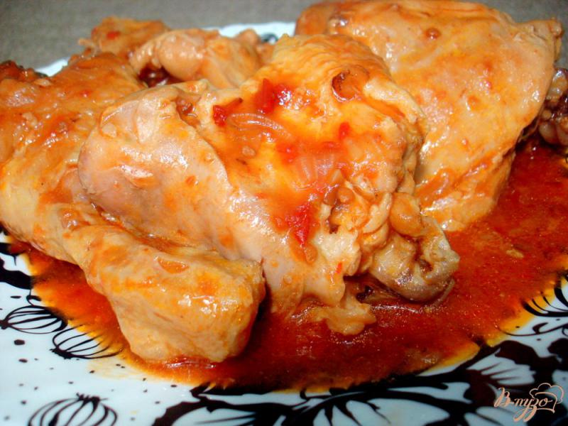 Фото приготовление рецепта: Курица в томатно - луковом соусе шаг №9