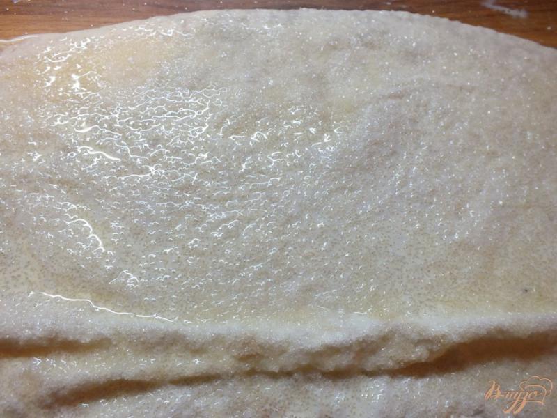 Фото приготовление рецепта: Пирог из лаваша с изюмом крученый шаг №4