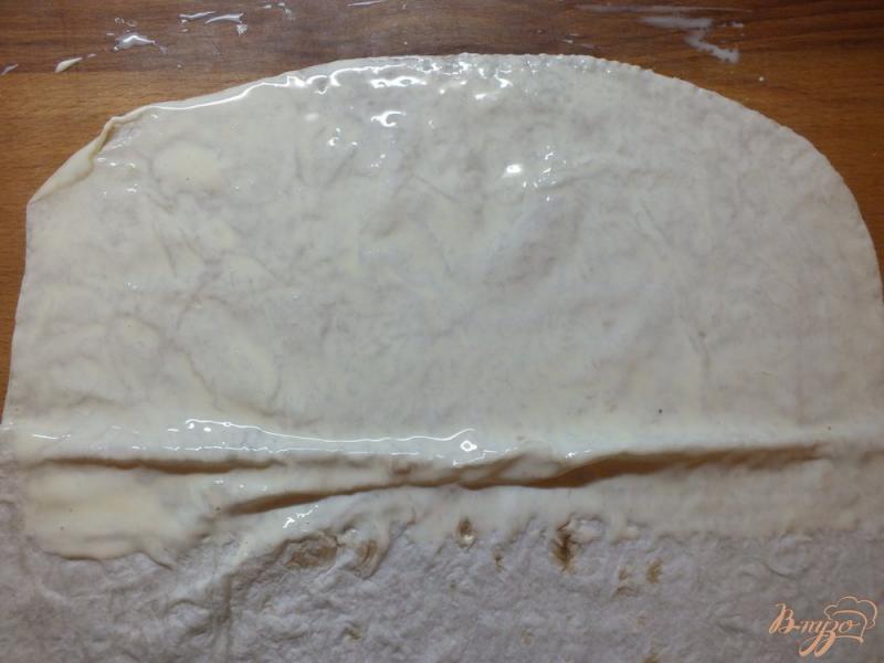 Фото приготовление рецепта: Пирог из лаваша с изюмом крученый шаг №3