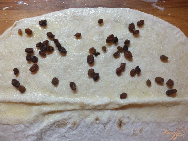 Фото приготовление рецепта: Пирог из лаваша с изюмом крученый шаг №5