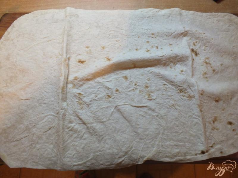 Фото приготовление рецепта: Пирог из лаваша с изюмом крученый шаг №2