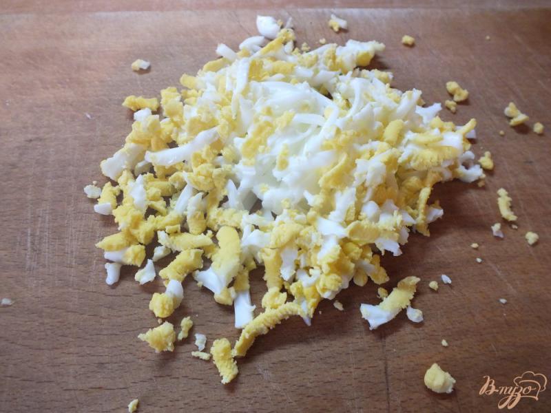 Фото приготовление рецепта: Салат из корня сельдерея с яйцом шаг №7