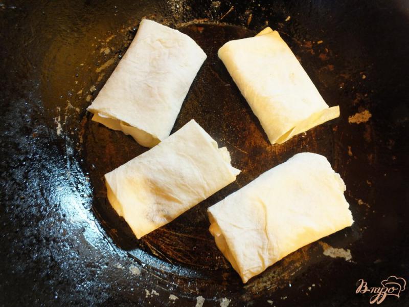 Фото приготовление рецепта: Пирожки с картошкой из лаваша шаг №9