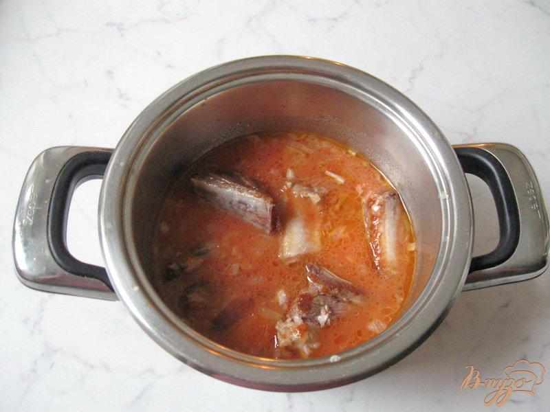 Фото приготовление рецепта: Свиные ребрышки в кисло-сладком соусе шаг №8