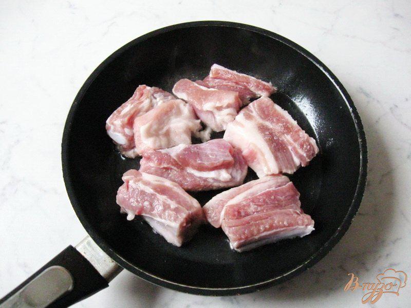 Фото приготовление рецепта: Свиные ребрышки в кисло-сладком соусе шаг №2