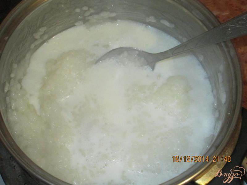 Фото приготовление рецепта: Рисовая  молочная  каша шаг №3
