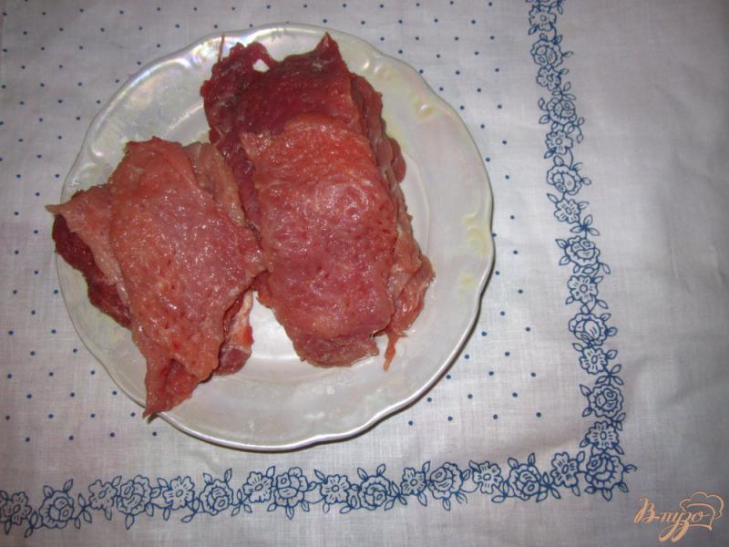 Фото приготовление рецепта: Свиные отбивные в томатном соусе шаг №1
