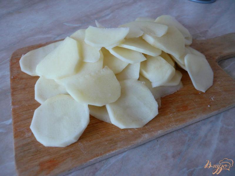 Фото приготовление рецепта: Свинина запеченная с картофелем шаг №4