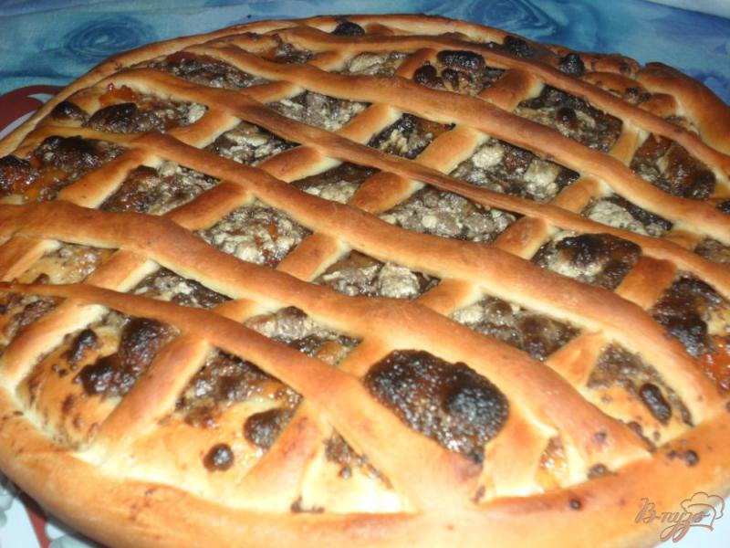 Фото приготовление рецепта: Пирог с повидлом и халвой шаг №8
