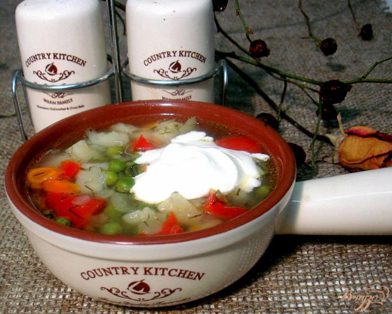 Фото приготовление рецепта: Суп с зелёным горошком и перцем шаг №9