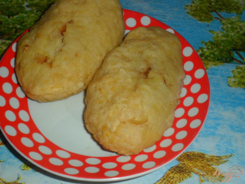 Фото приготовление рецепта: Картофельные пирожки с тушеной капустой шаг №6